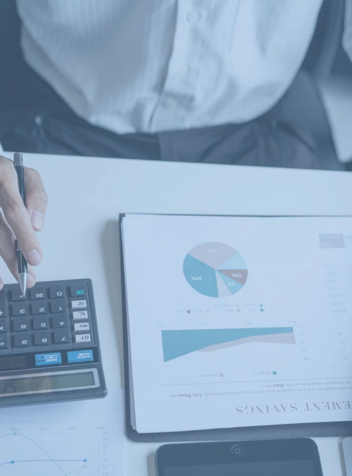Construction professionals planning budgets and reviewing project costs while maintaining high-quality materials and execution standards for efficient and cost-effective project delivery.