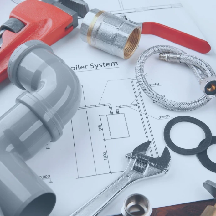Installation of mechanical, electrical, and plumbing (MEP) systems in a commercial building, including HVAC ductwork, electrical wiring, and water supply infrastructure designed for efficient and reliable building performance.